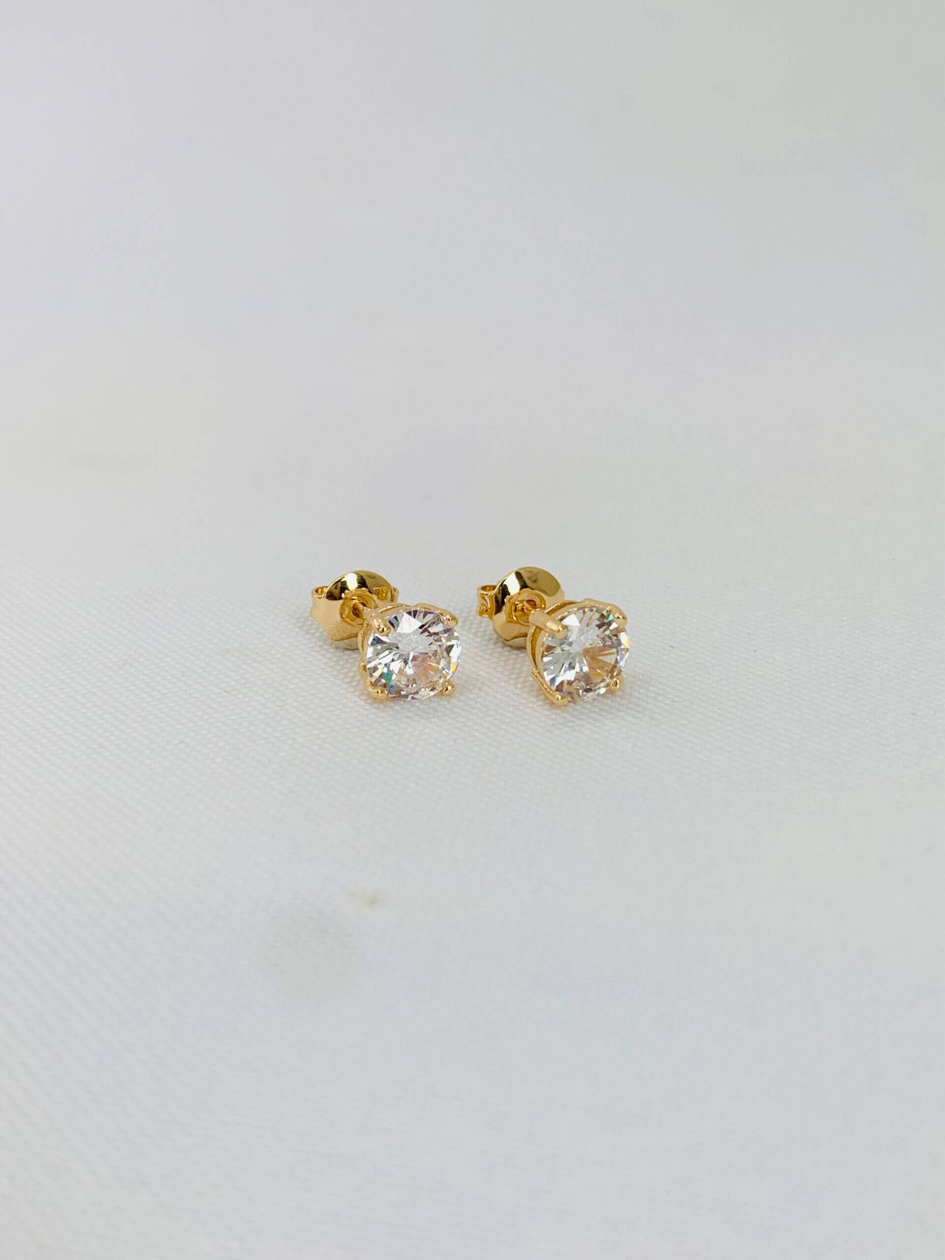 Brinco Ponto de Luz Fluir P Camila - em banho ouro 18k