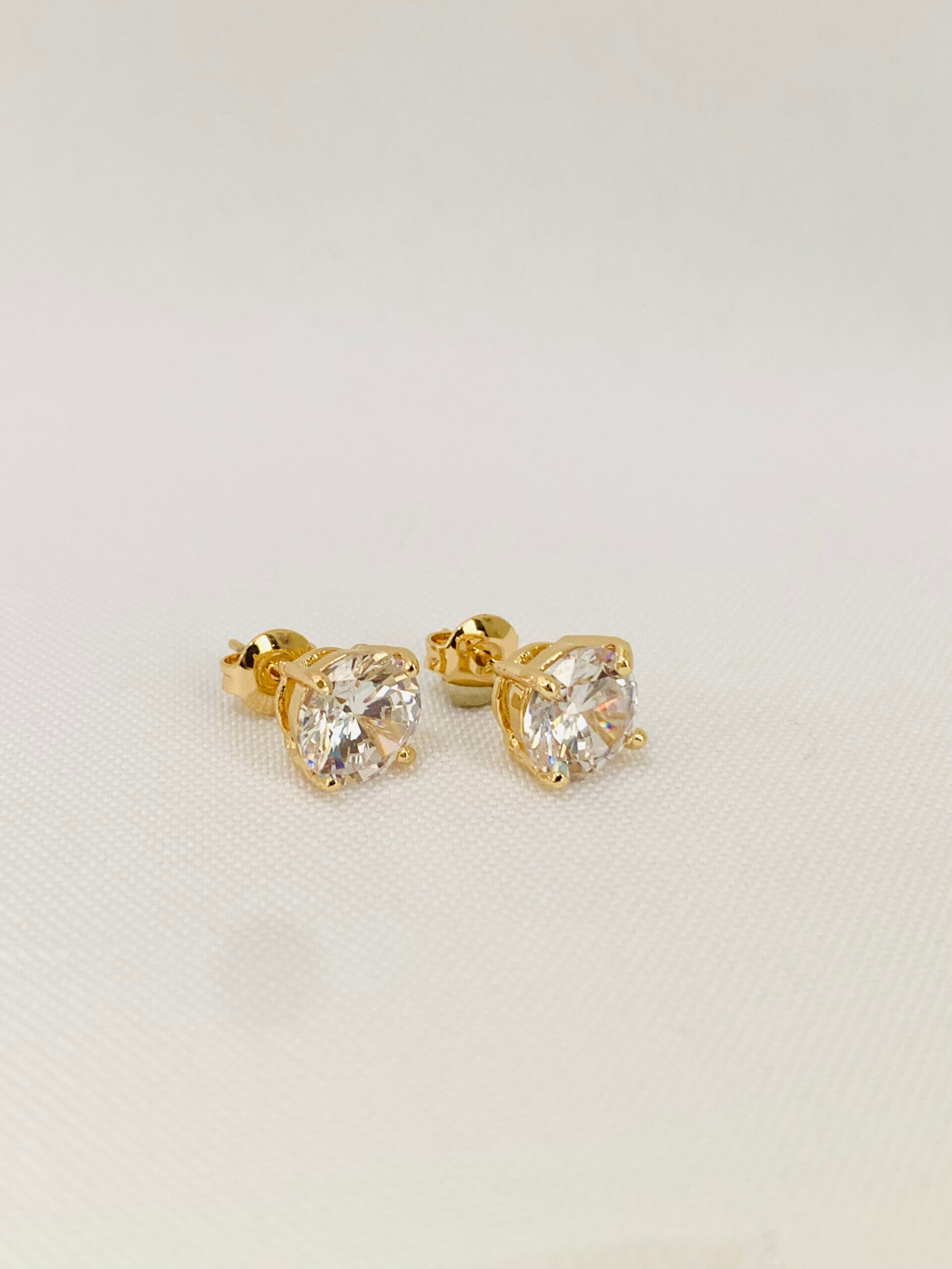 Brinco Ponto de Luz Fluir G Camila - em banho ouro 18k